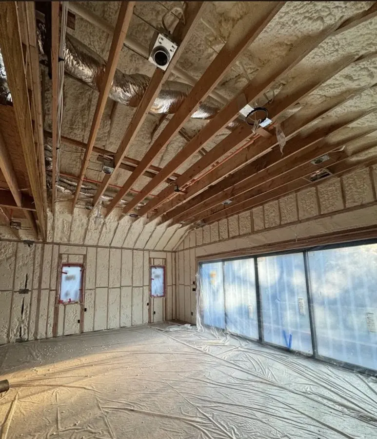 Interior walls and ceiling insulated with spray foam during new construction in Elizabeth